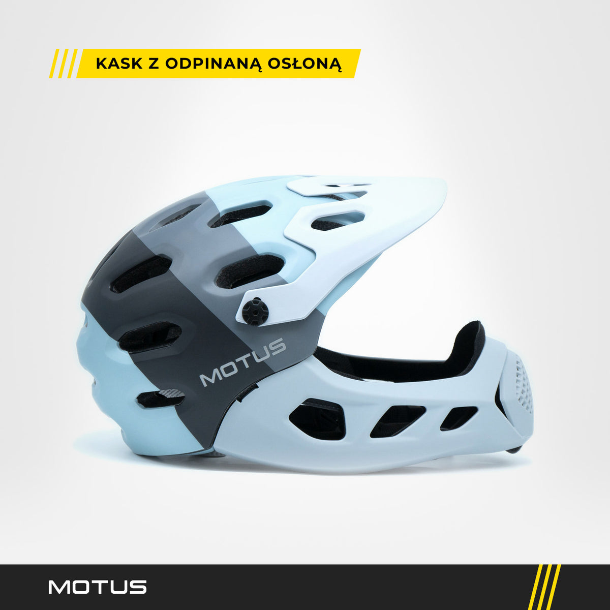 Kask MOTUS MTB szary z założoną osłoną podbródka i daszkiem, widok z boku, logo MOTUS na grafitowym pasie.