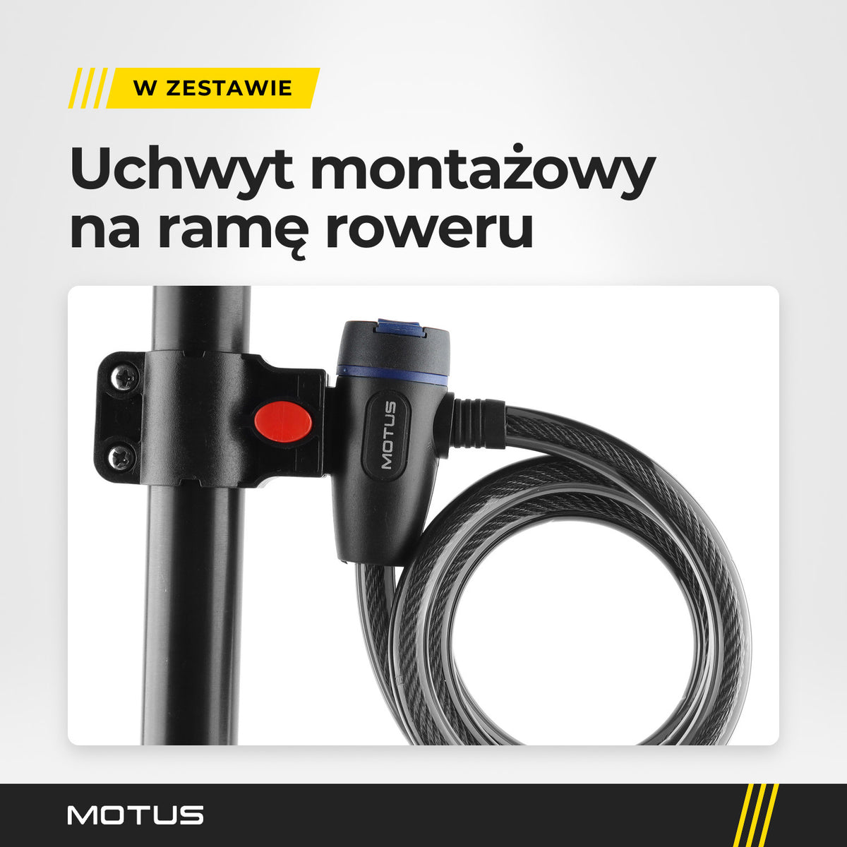 Zamek zapięcia MOTUS wpięty w uchwyt montażowy na czarnej rurze, obok zwinięta spiralna linka.